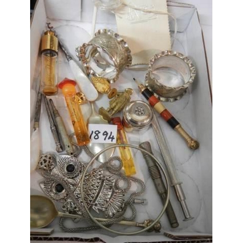 1894 - A mixed lot including perfume bottles, pencils, napkin rings etc.,