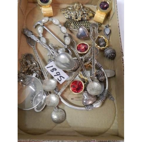 1895 - A mixed lot including brooches, spoons etc.,