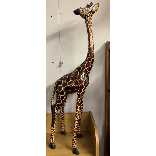 1606 - 2 realistic carved wooden giraffes, height 90cm & 44cm