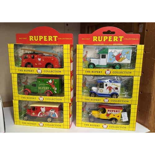 1613 - A set of 12 Rupert The Bear boxed die cast vehicles & a boxed Eddie Stobart lorry