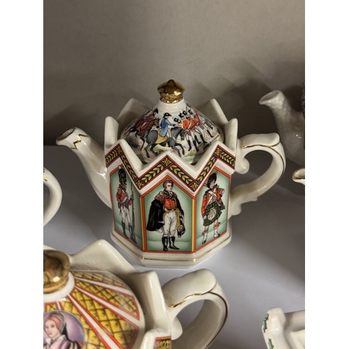 1632 - 9 collectable teapots, 1 Wade & 8 Sadler