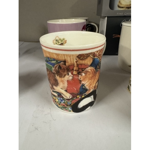 1634 - A quantity of new & unused mugs featuring dogs, cats, gardening, golf & a boxed pheasant mug with co... 