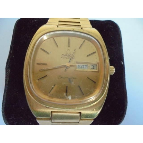 10 - A Gents' automatic Omega day/date wrist watch.