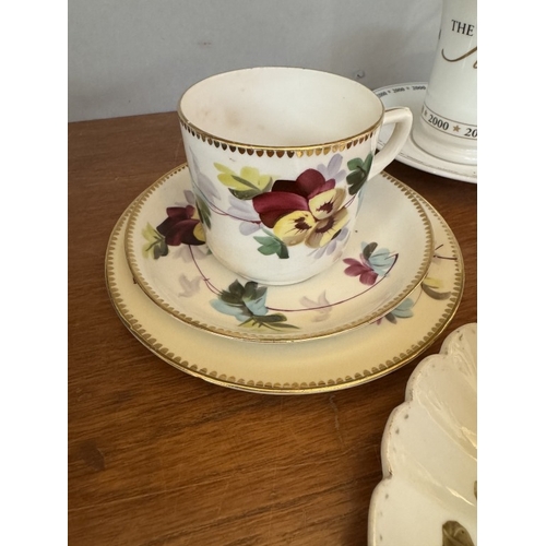 1721 - A large early 20th century moustache cup & saucer & 4 cups & saucers