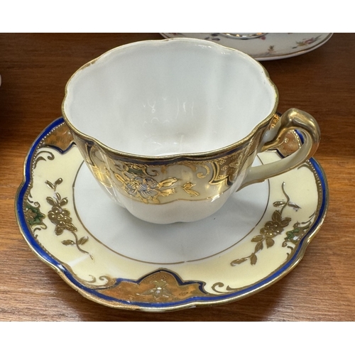 1721 - A large early 20th century moustache cup & saucer & 4 cups & saucers