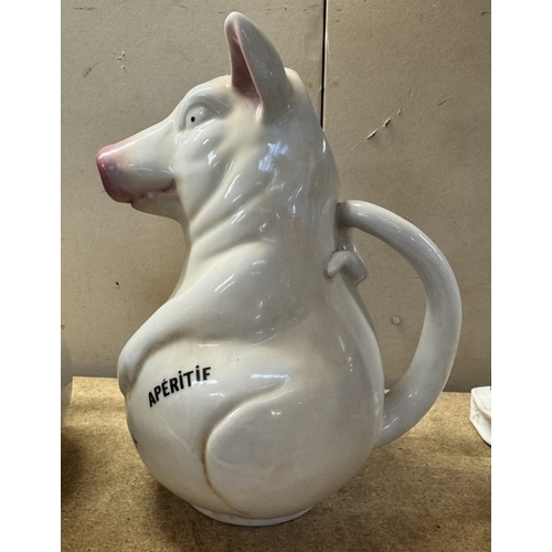 1730 - A pair of ceramic pig advertising water jugs