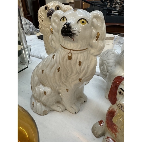 1749 - A pair of Royal Doulton Staffordshire dogs & 4 odd dogs