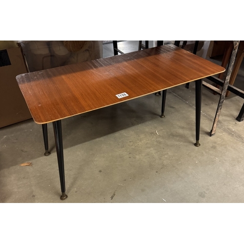 1755 - A retro teak veneered coffee table