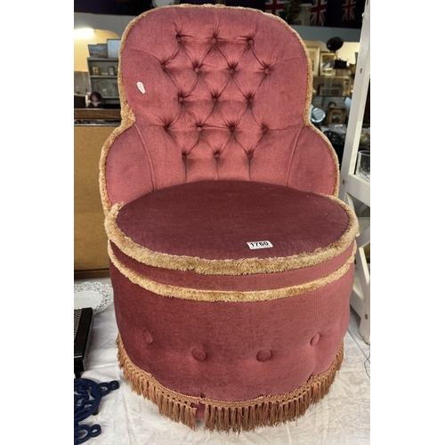 1760 - A deep buttoned pink Draylon tub chair