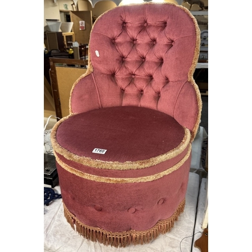 1760 - A deep buttoned pink Draylon tub chair