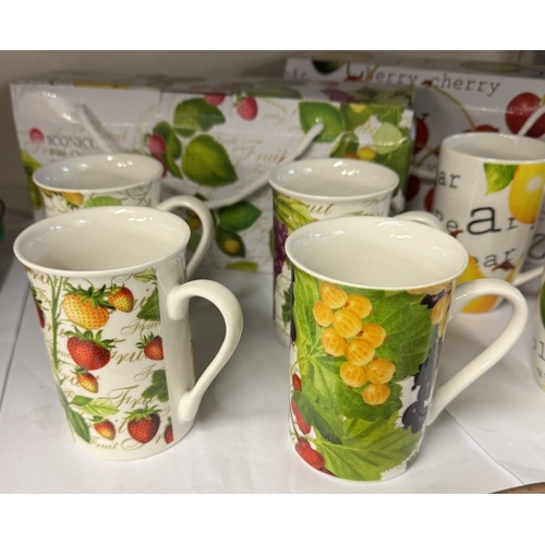 1661 - 2 boxed sets of 4 Konico fine china fruit decorated mugs