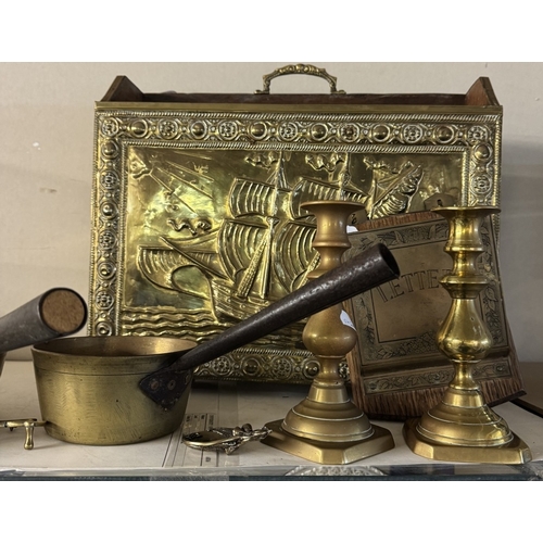 1665 - A Victorian brass jam pan, set of 3 graduated saucepans, a pair of candlesticks & other brassware