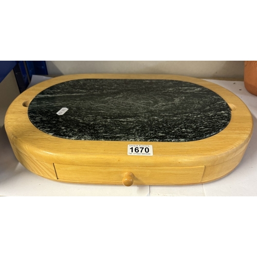 1670 - A good cheese board with polished stone top & drawer with cheese knives