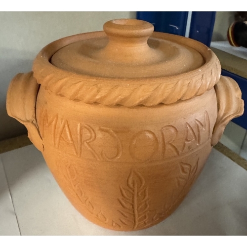 1671 - 4 terracotta storage jars carved and a wooden Buddha shortbread mould (1 A/F)