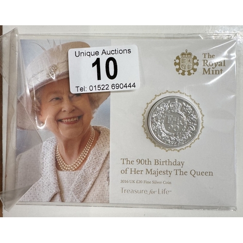 10 - An 1879 silver Dollar,  a Royal mint 90th birthday silver £20 coin & other Crowns etc.