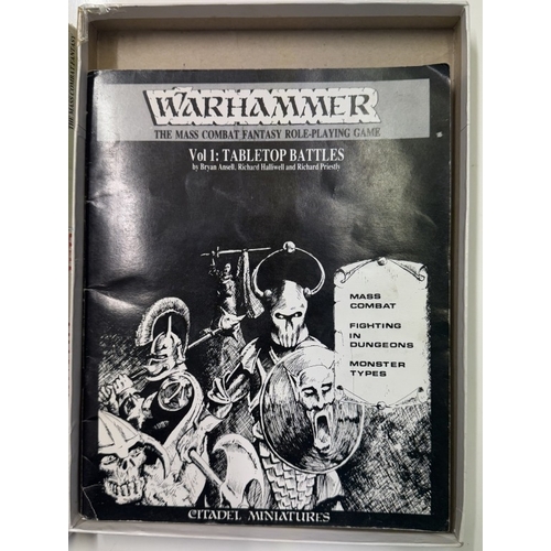 226 - A boxed Warhammer The Mass Combat Fantasy role-playing game with 3 rule books (Completeness unknown,... 