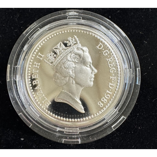 9 - 4 boxed silver proof coins including £1 coin, 80th birthday Crown & Bahamas Charles $10