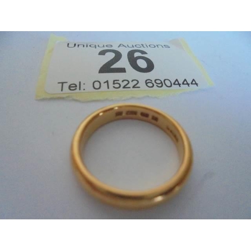 26 - A 22ct gold wedding ring, size J, 5 grams.