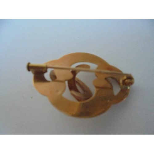 30 - A 9ct gold brooch (3.48 grams) and a yellow metal brooch.