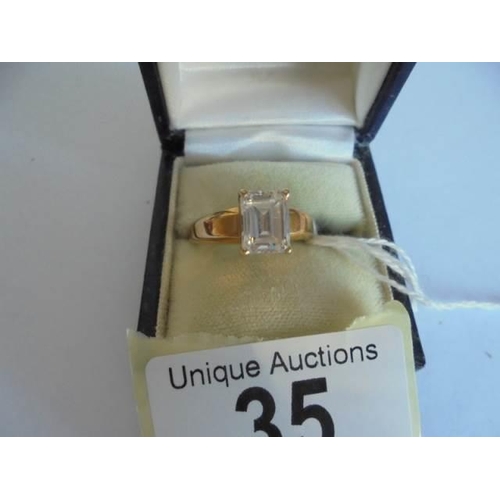 35 - A 9ct gold ring set clear stone, size R, 4.2 grams.