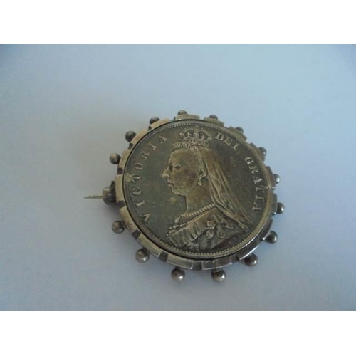 41 - An 1887 Victorian silver coin as a brooch, another brooch and a pendant.