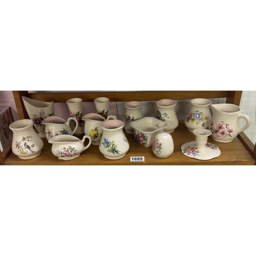 1695 - A large collection of Axe Vale pottery (3 shelves)