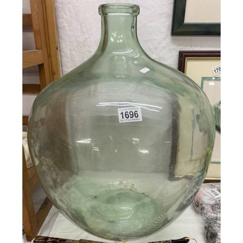 1696 - A large glass carboy, height 54cm