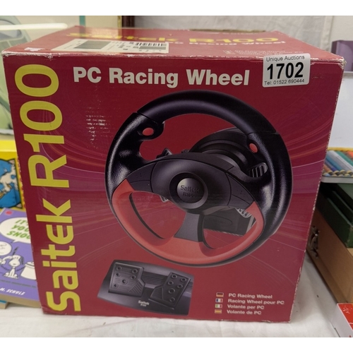 1702 - A boxed Saitek R100 P.C. racing wheel