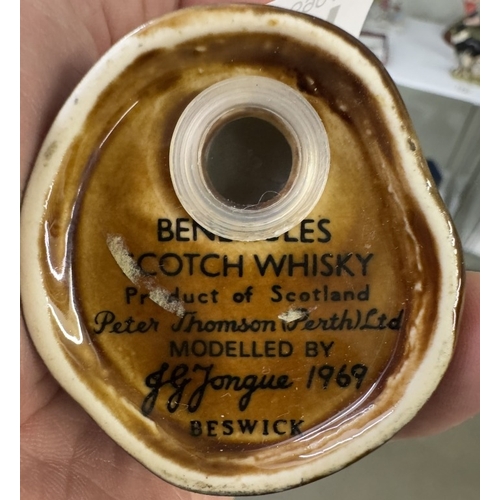 1711 - 2 Beswick Ben Eagles whiskey miniatures & contents of a bear & an eagle