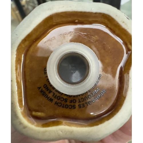 1711 - 2 Beswick Ben Eagles whiskey miniatures & contents of a bear & an eagle