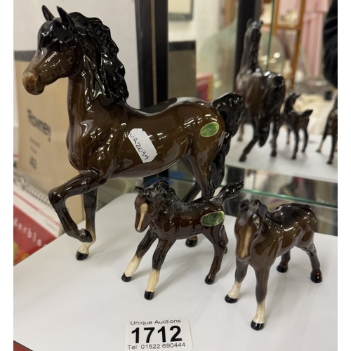1712 - 2 Beswick horses & 1 Royal Doulton
