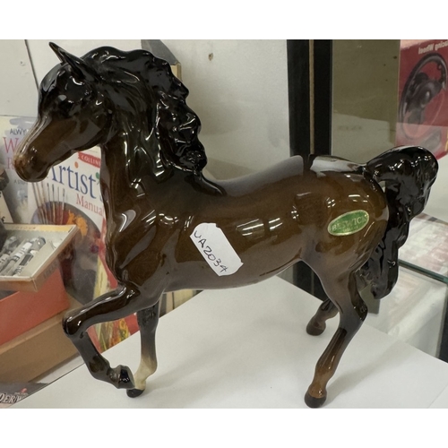 1712 - 2 Beswick horses & 1 Royal Doulton