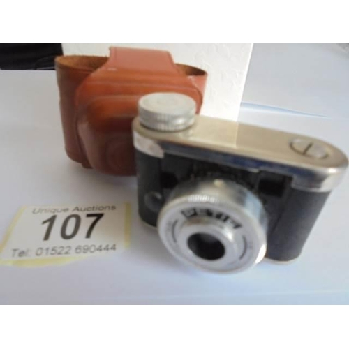 107 - A cased PETIE miniature camera, made in Western Germany.