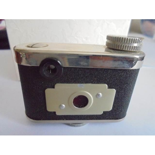 107 - A cased PETIE miniature camera, made in Western Germany.