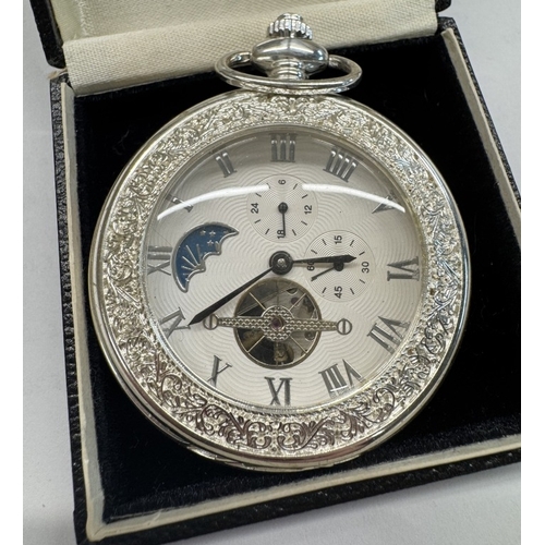 1782 - A Decorative white metal mechanical moon phase pocket watch in working order