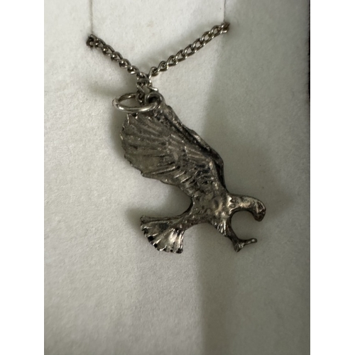 1786 - A white metal pendant of an eagle on chain & another