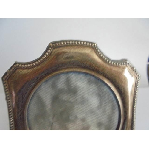 114 - An early 20th century silver photo frame.