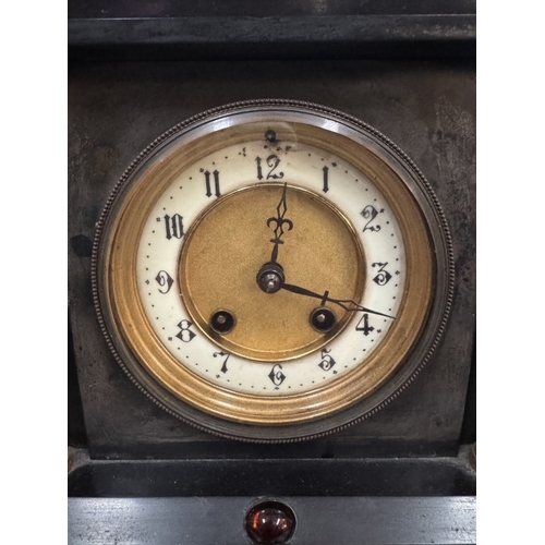 1856 - A 19th century black slate Palladian mantle clock