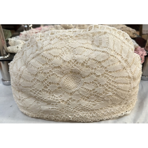 1872 - A tea cosy with lace cover & a quantity of doilies