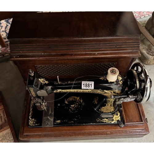 1881 - A vintage Singer sewing machine, serial number S826962