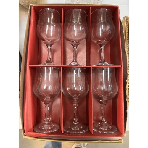 1916 - A mid 20th century cut glass decanter and a boxed set of six glasses.