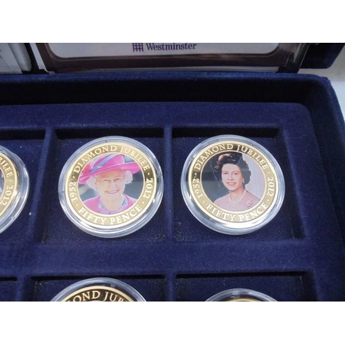 33 - 22 cased 1952-2012 Diamond Jubilee gold plate coins, A Royal Engagement coin and Roman Army coin.