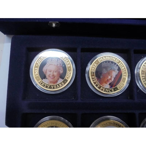 33 - 22 cased 1952-2012 Diamond Jubilee gold plate coins, A Royal Engagement coin and Roman Army coin.