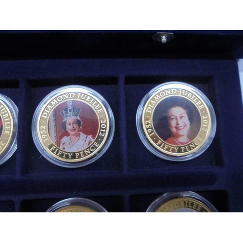 33 - 22 cased 1952-2012 Diamond Jubilee gold plate coins, A Royal Engagement coin and Roman Army coin.