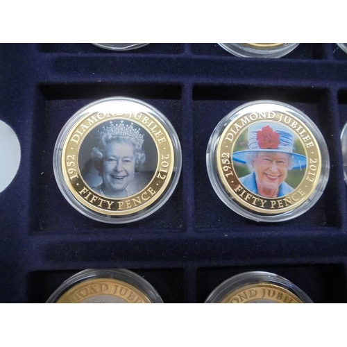 33 - 22 cased 1952-2012 Diamond Jubilee gold plate coins, A Royal Engagement coin and Roman Army coin.