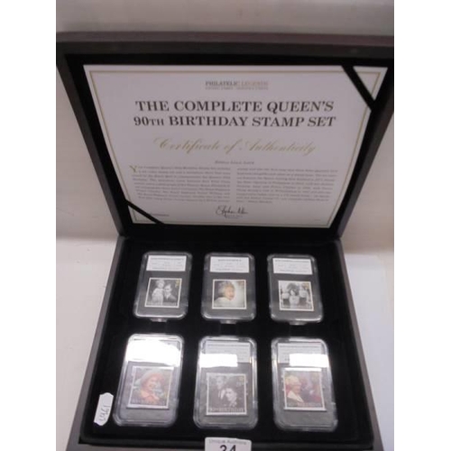 34 - The Complete Queens 90th Birthday stamp set in case.