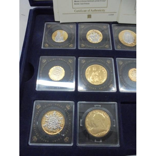 35 - Eight cased Queen Elizabeth II coins and a Victoria coin.