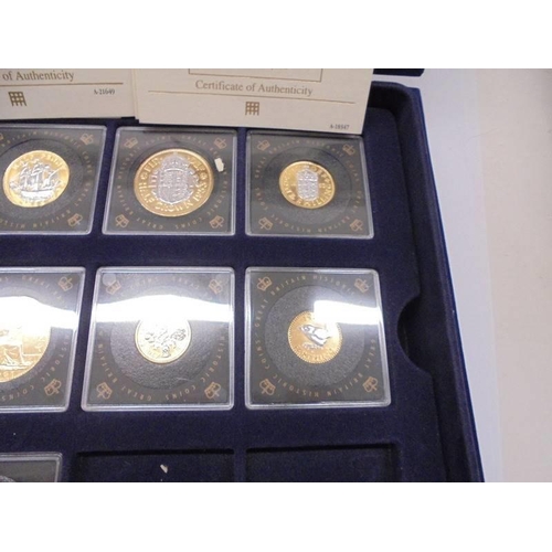 35 - Eight cased Queen Elizabeth II coins and a Victoria coin.