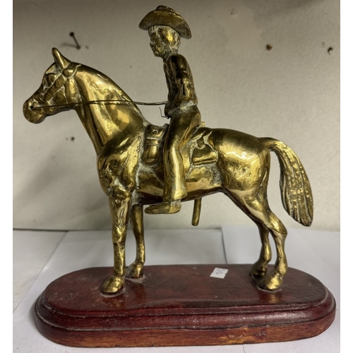 1800 - A brass horse mounted with cowboy, Another brass horse & an elephant