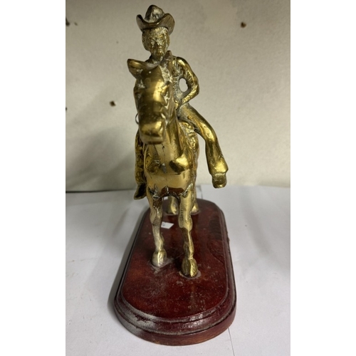 1800 - A brass horse mounted with cowboy, Another brass horse & an elephant